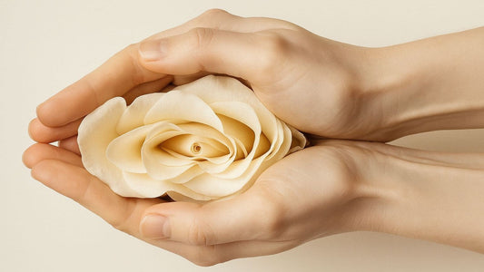 A young woman finding calm and natural relief from PMS with a cup of rose tea at home.